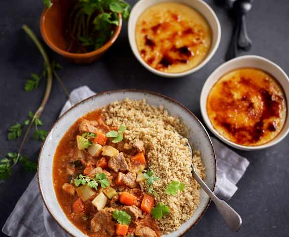 Menu: Cuscuz com borrego e legumes; Leite creme