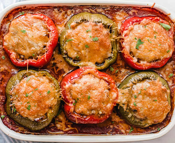 Beefy Stuffed Peppers with Tomato Sauce