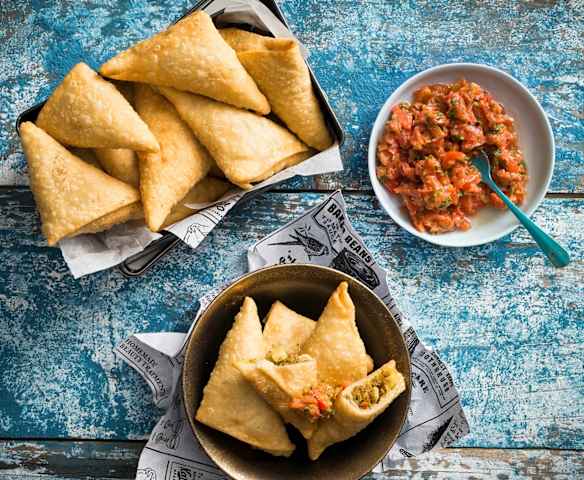 Samosa with fresh tomato chutney