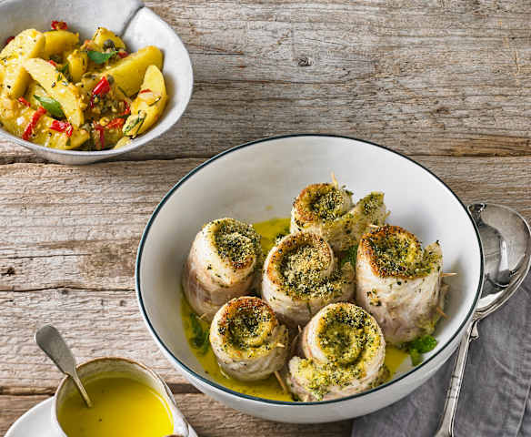 Wolfsbarschröllchen mit Orangensauce