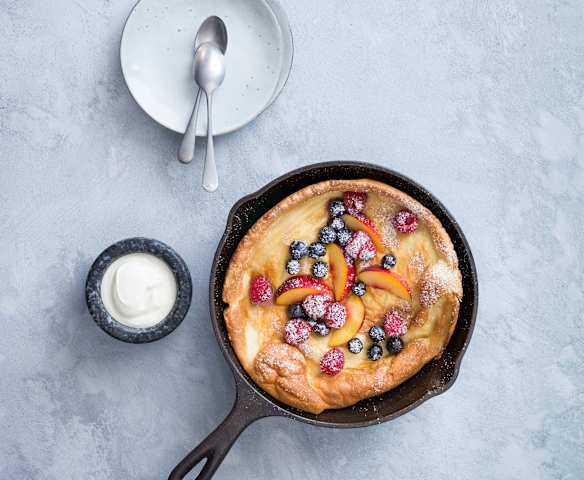 Dutch baby pancake with fruit and yoghurt