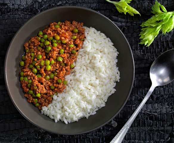Riso con piselli e ragù
