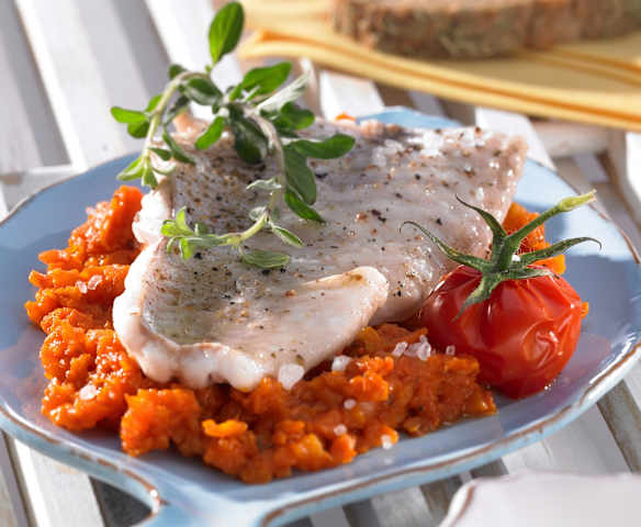 Fischfilet mit Tomatengemüse