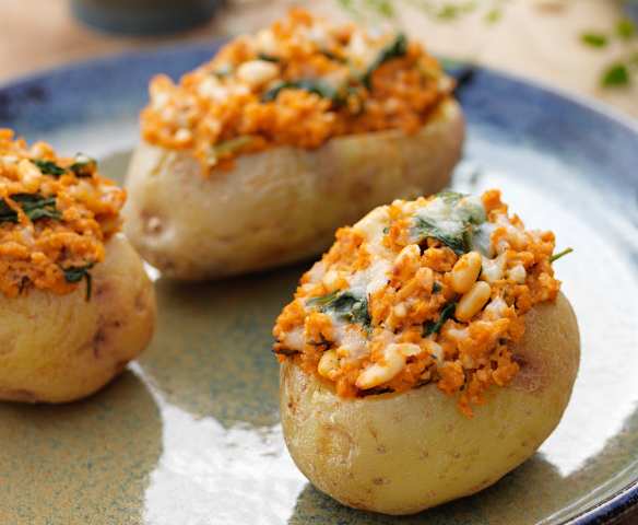 Potatoes Stuffed with Soya Mince, Spinach and Pine Nuts