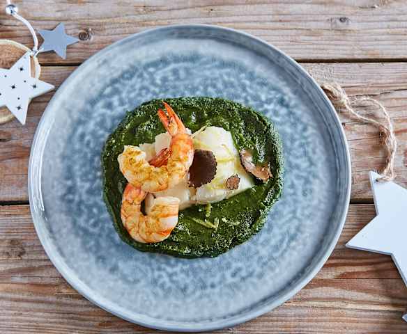 Baccalà e mazzancolle su crema di spinaci