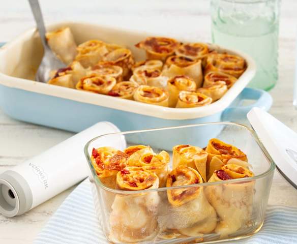 Rolos de crepes gratinados