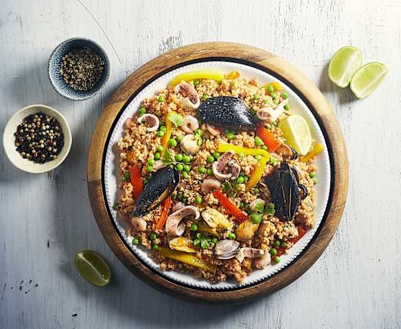 Paella di pesce con bulgur Paella di pesce con bulgur