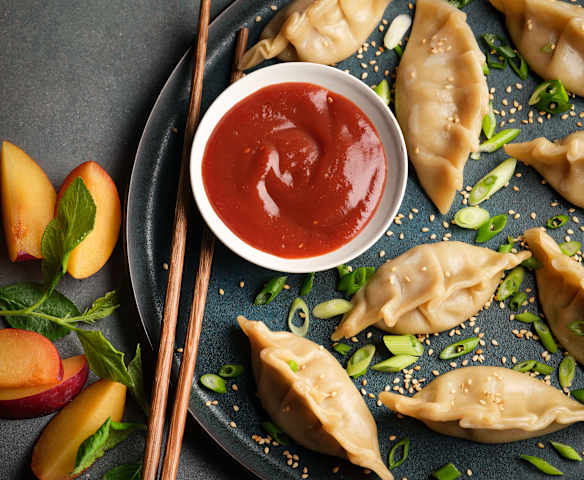 Steamed Duck Dumplings with Sticky Plum Dipping Sauce