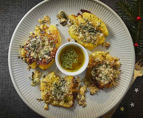 Patate schiacciate al forno Patate schiacciate al forno