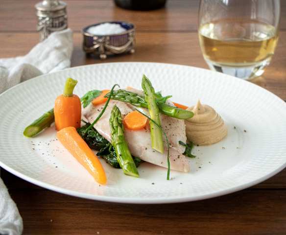 Sous-vide fish with lemon and herbs