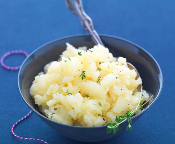 Patate schiacciate all'olio extravergine di oliva Patate schiacciate all'olio extravergine di oliva