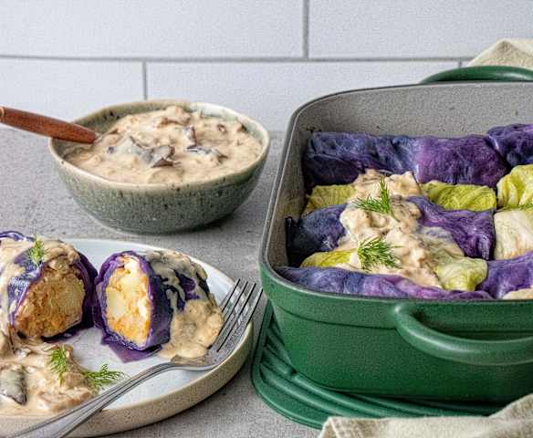 Rainbow cabbage rolls with mushroom sauce