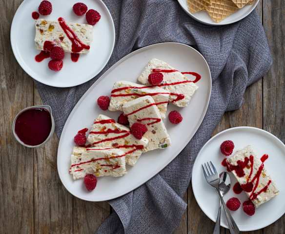 Nougat glacé with raspberry coulis