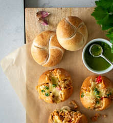 Kaiser rolls filled with cheesy chicken filling