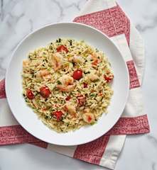 Prawns in chilli butter with risoni and herb salad