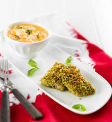 Filetes de peixe com arroz malandro de cenoura