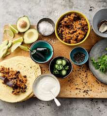 Tex-Mex tortilla's met varkensreepjes en zwarte bonen