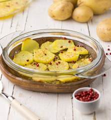 Patate gratinate con pepe rosa e Parmigiano reggiano