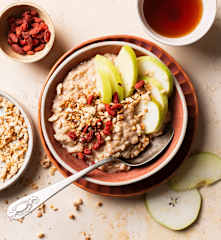 Vegan porridge with fruits and cinnamon
