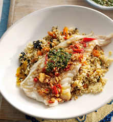 Marinated white fish fillets with chermoula sauce and couscous salad