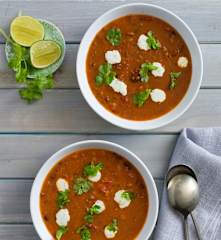 Black bean tomato soup with coriander lime cream