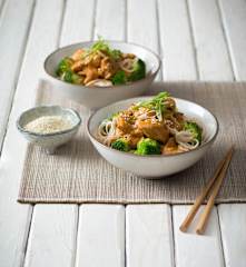 Orange sesame chicken with broccoli and noodles