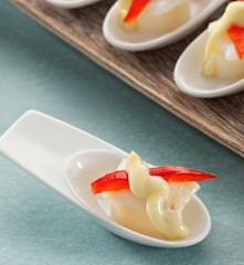 Bacalao confitado con pimientos rojos y emulsión de pilpil