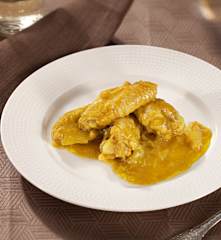 Alitas de pollo con cebolleta al curry