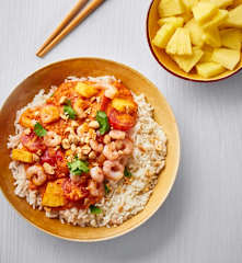 Gamberetti saltati con ananas e riso basmati
