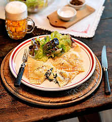 Erdäpfelschlutzer mit Spinat und Bergkäse