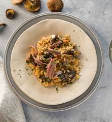 Arroz con setas y anchoas