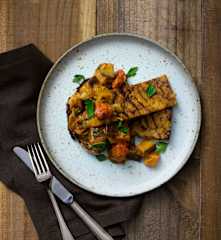 Eggplant and tomato breakfast hash with crispy tempeh