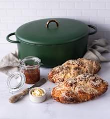 Plaited loaves with crumble topping baked in a cast iron pot