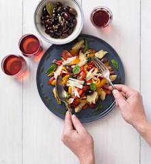 Warm capsicum and tomato salad with olives