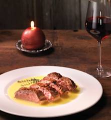 Petto d'anatra a bassa temperatura con salsa all'arancia