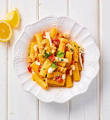 Rigatoni con ragù di dentice, pomodorini e limone