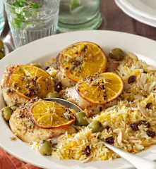Poulet rôti aux épices et à l'orange, riz basmati et raisins secs