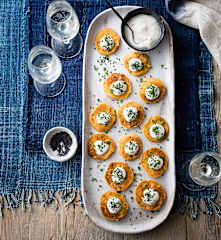 Sweet potato blini with cumin & sesame crème fraîche