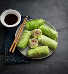 Steamed cabbage rolls with spicy sauce
