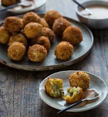 Pumpkin and blue cheese arancini with smoky yoghurt dressing