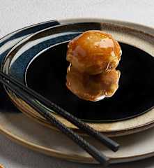 Mordiscos cristal al caramelo con crema de naranja