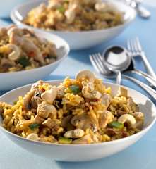 Geschnetzelte Hähnchenbrust mit Gemüse und Curryreis