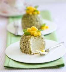 Steamed pistachio cheesecakes with mango