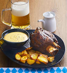 Stinco di maiale con patate