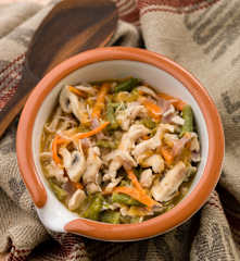 Salteado de frango com molho de laranja