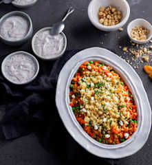 Kuskus z morelami, orzechami laskowymi, fetą i warzywami; Krem stracciatella