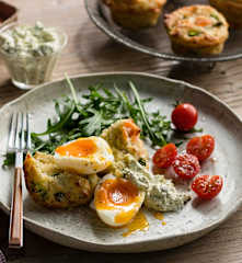Smoked salmon muffins with steamed eggs and herbed relish