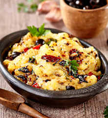 Mash de pommes de terre, piquillos et olives