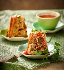 Steamed Sticky Rice with Pork (Rice Tube Puddings)