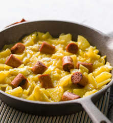 Patatas, huevos rotos y chistorra de merluza